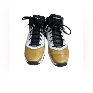 This is a pair of Air Jordan B'Loyal sneakers in the "White Black Gold"